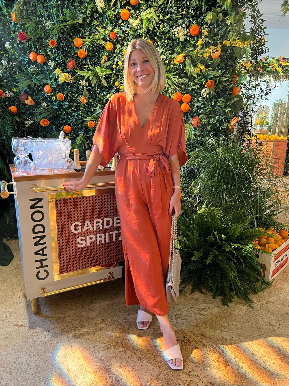 Anthropologie Burnt Orange Wrap Jumpsuit with Tie Waist